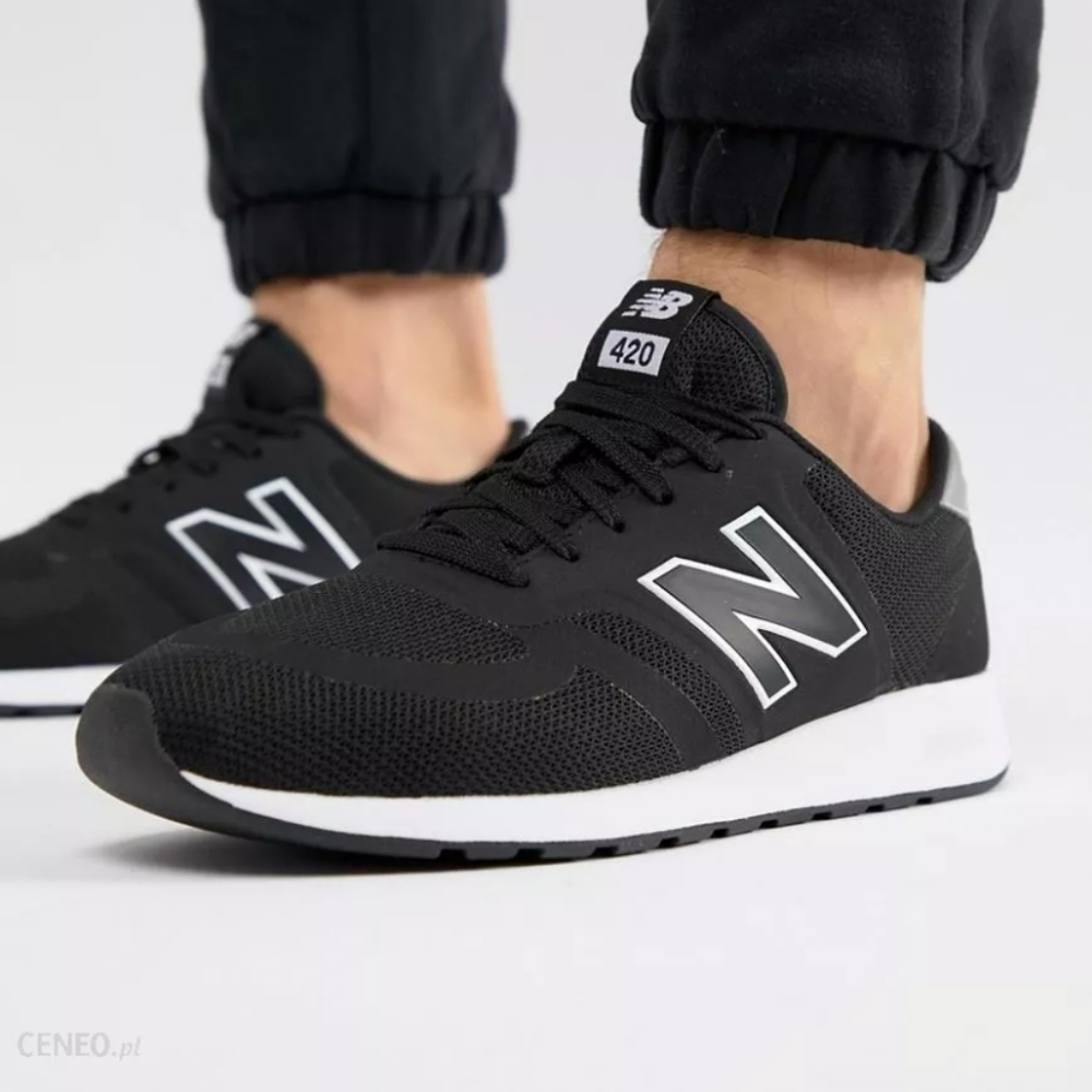 New Balance Women's Black and White Sneakers